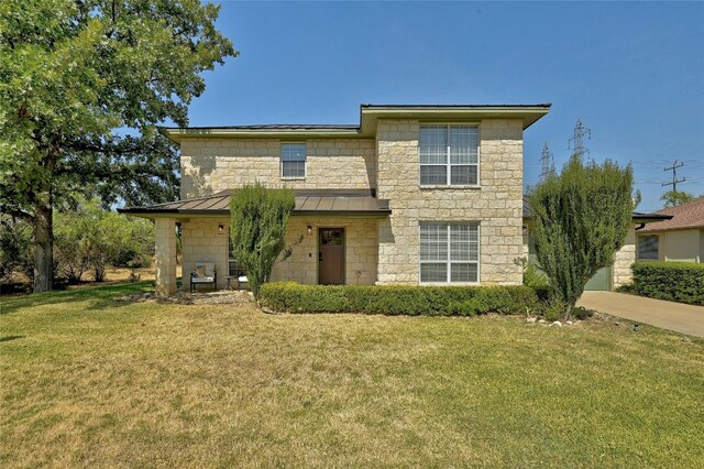 view of front of home with a front yard