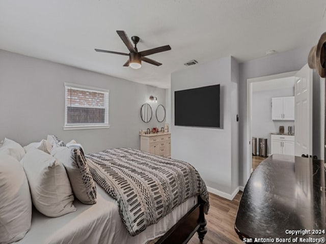 bedroom featuring light hardwood / wood-style flooring and ceiling fan