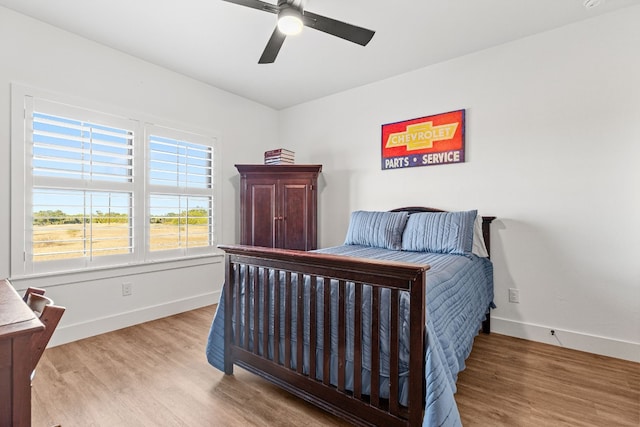 345 Judges Rd, Burnet, TX 78611 - bedroom featuring wood finished floors and ceiling fan