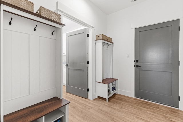 mudroom with light wood-type flooring