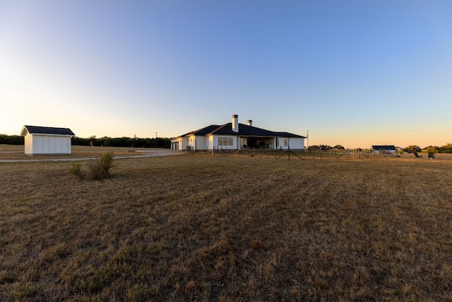 345 Judges Rd, Burnet, TX 78611 - view of grassy yard featuring a storage unit