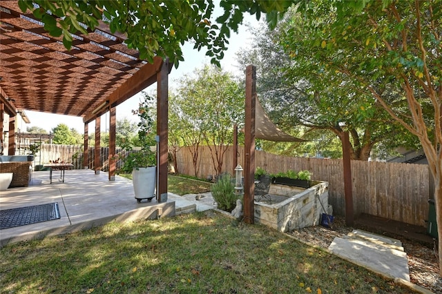 view of yard with a fenced backyard, a patio, and a pergola