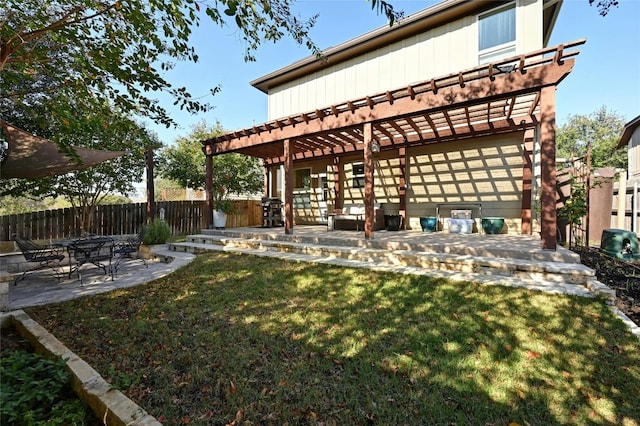 view of yard with a pergola and a patio