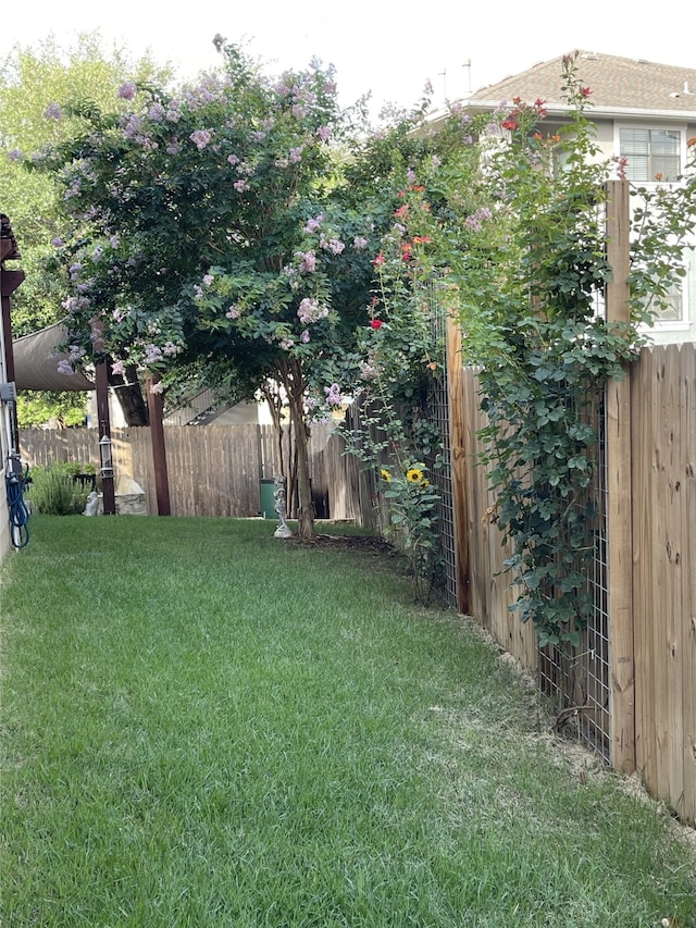 view of yard with fence