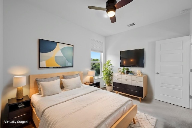 bedroom featuring visible vents and a ceiling fan