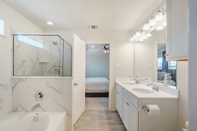 bathroom featuring separate shower and tub, ceiling fan, vanity, and wood-type flooring