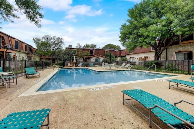 view of pool featuring a patio