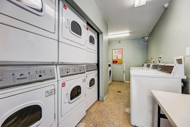 laundry room featuring washer and dryer and stacked washer / dryer