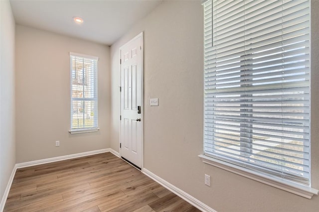 196 Lost Mine Peak Ln, Dripping Springs, TX 78620 - entryway with wood finished floors, baseboards, and recessed lighting