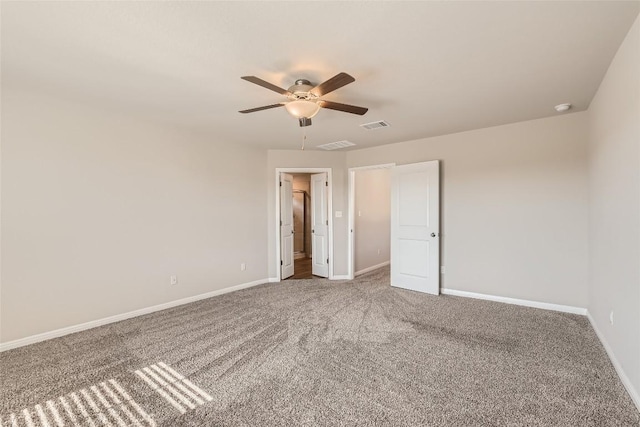 196 Lost Mine Peak Ln, Dripping Springs, TX 78620 - unfurnished bedroom featuring baseboards, carpet, and a ceiling fan