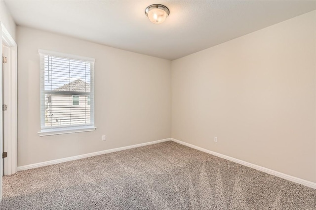196 Lost Mine Peak Ln, Dripping Springs, TX 78620 - carpeted spare room featuring baseboards
