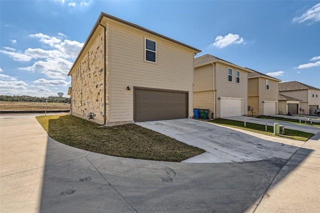196 Lost Mine Peak Ln, Dripping Springs, TX 78620 - view of front facade with a garage and driveway