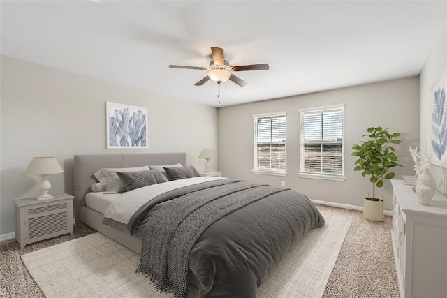 196 Lost Mine Peak Ln, Dripping Springs, TX 78620 - bedroom with light carpet, baseboards, and ceiling fan