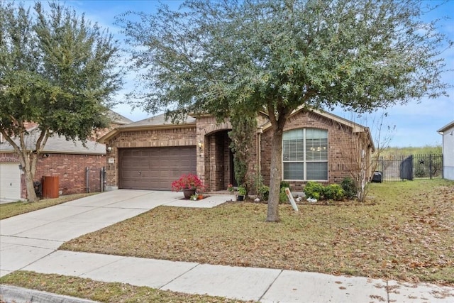 view of front of house with a garage and a front yard