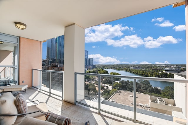 balcony featuring a water view