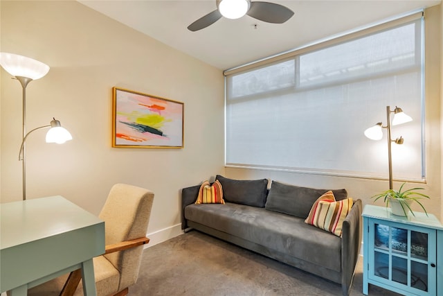 living room featuring ceiling fan