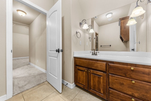 bathroom featuring vanity and tile patterned flooring