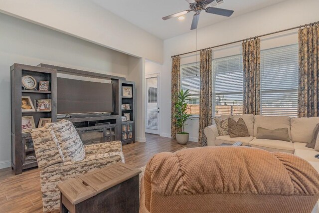 2104 Highland Ridge Rd, Georgetown, TX 78628 - living area featuring a ceiling fan and wood finished floors