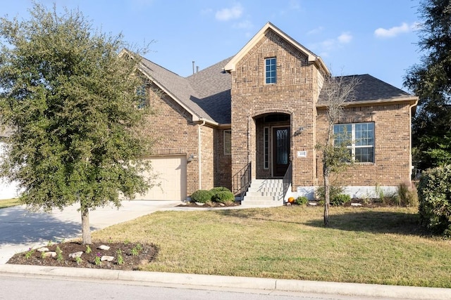 view of front property featuring a garage and a front lawn