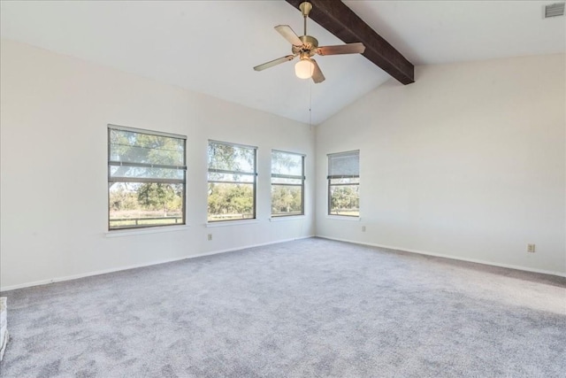 carpeted empty room featuring vaulted ceiling with beams and ceiling fan