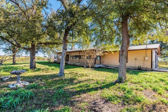 view of front of house with a front lawn