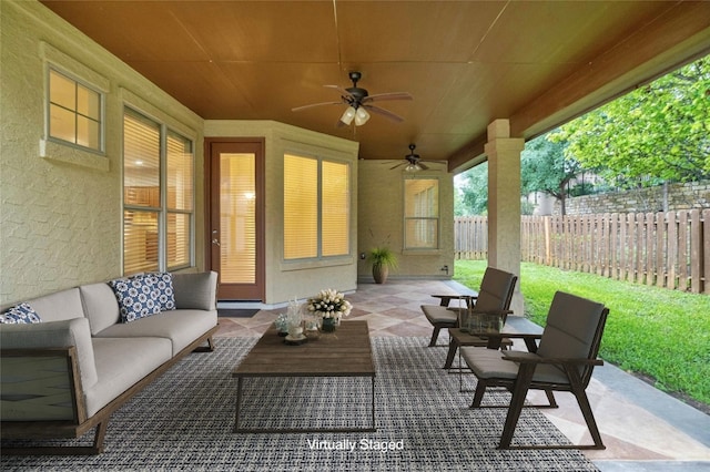 view of patio featuring outdoor lounge area and ceiling fan