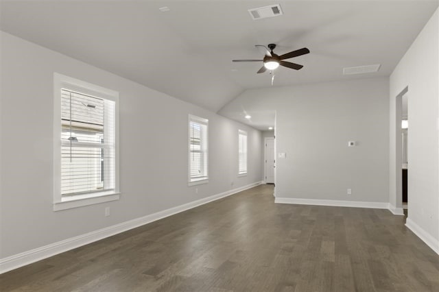 unfurnished living room featuring ceiling fan, dark wood-type flooring, and vaulted ceiling