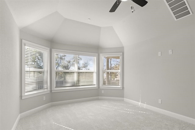 unfurnished room featuring carpet floors, ceiling fan, and lofted ceiling