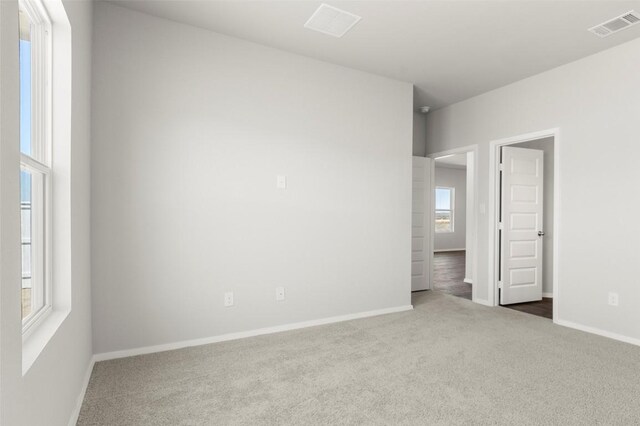 224 Barley Ln, Elgin, TX 78621 - empty room with carpet flooring, baseboards, and visible vents