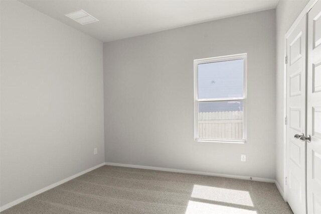 224 Barley Ln, Elgin, TX 78621 - unfurnished bedroom with light colored carpet and baseboards