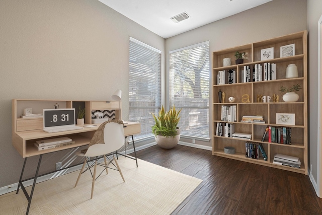 home office featuring dark hardwood / wood-style floors