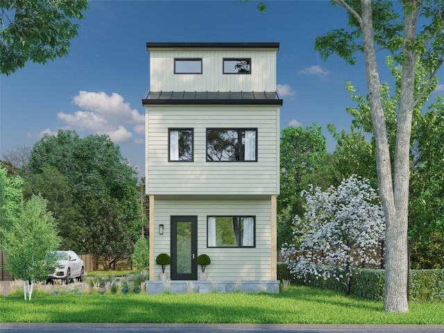 view of front of home featuring a front lawn