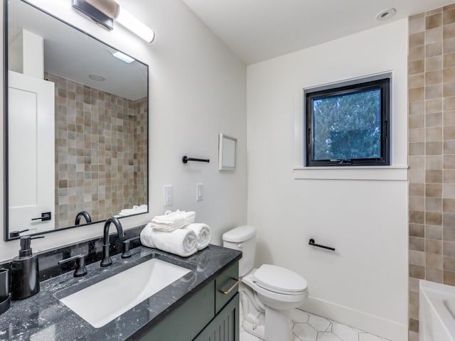 bathroom with toilet, vanity, tile patterned floors, and tile walls