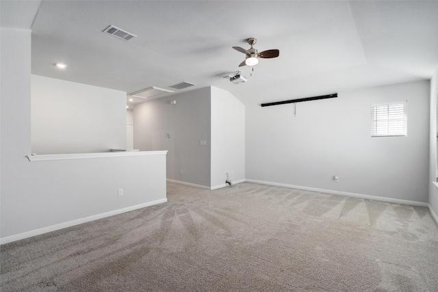 empty room featuring light carpet and ceiling fan