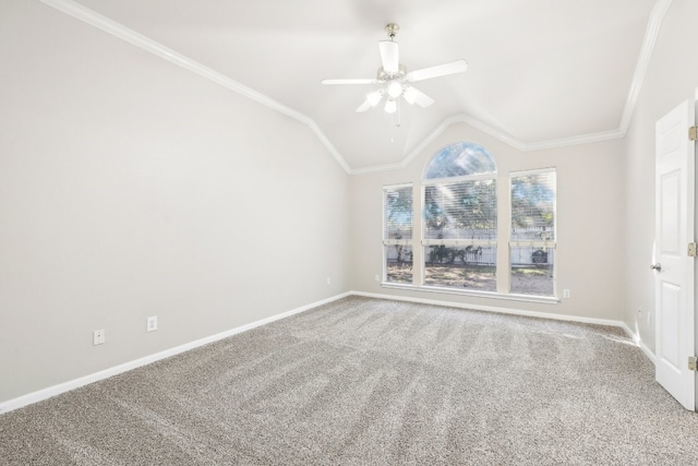 carpeted spare room with crown molding, ceiling fan, and lofted ceiling