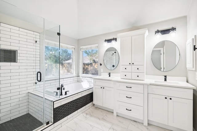 bathroom featuring separate shower and tub and vanity