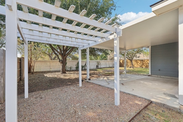 view of yard with a pergola and a patio