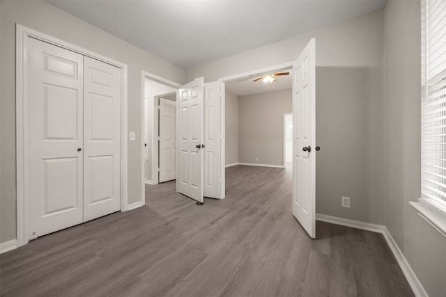 unfurnished bedroom featuring a closet and light hardwood / wood-style flooring