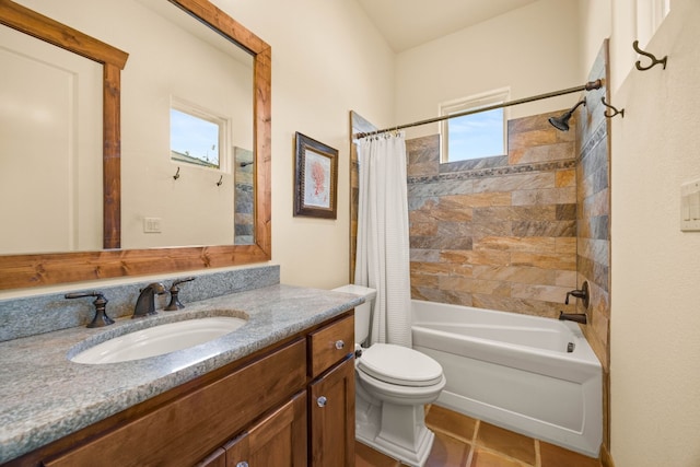 full bathroom featuring shower / tub combo, vanity, toilet, and plenty of natural light