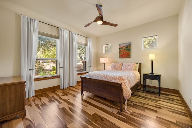 bedroom featuring light hardwood / wood-style flooring and ceiling fan