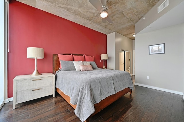 bedroom with a closet, ceiling fan, and dark hardwood / wood-style flooring