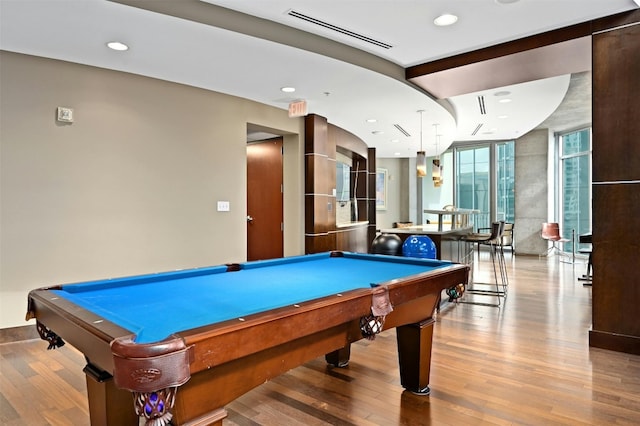 game room with light hardwood / wood-style flooring and pool table