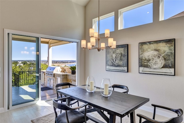 dining space with a notable chandelier