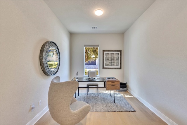 office area featuring light hardwood / wood-style floors