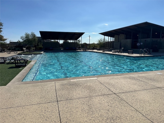 view of pool featuring a patio area