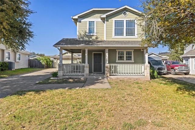 view of front of home with a front lawn and covered porch