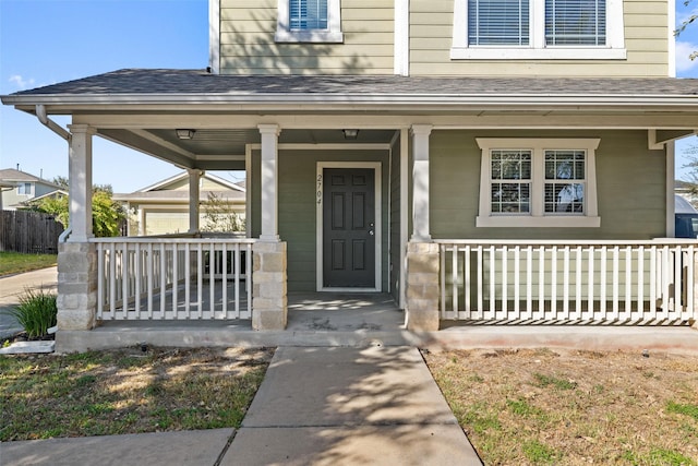 doorway to property with a porch