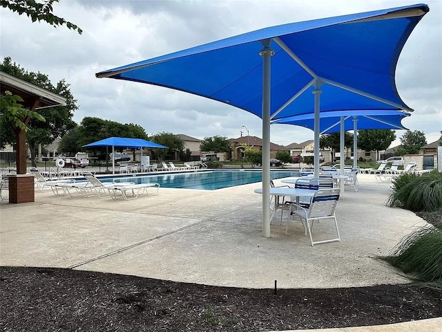 view of swimming pool featuring a patio