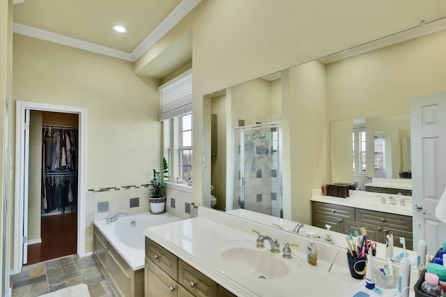 2918 Ranch Road 620 N Unit R296, Austin, TX 78734 - bathroom with a shower stall, vanity, ornamental molding, a garden tub, and stone finish floors