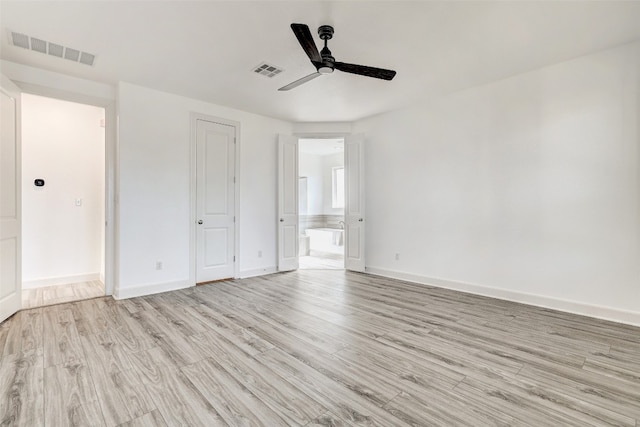 unfurnished bedroom featuring ceiling fan and light hardwood / wood-style floors